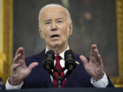 FILE - President Joe Biden speaks before signing a $95 billion Ukraine aid package that also includes support for Israel, Taiwan, and other allies, in the State Dining Room of the White House, April 24, 2024, in Washington. The Biden administration is due to deliver a first-of-its-kind formal verdict on whether Israel&rsquo;s conduct of its war in Gaza complies with international and U.S. laws.