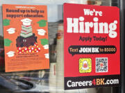 A sign seeking job applicants is displayed at a restaurant in Wheeling, Ill., Thursday, May 16, 2024. On Thursday, May 23, 2024, the Labor Department reports on the number of people who applied for unemployment benefits last week.(AP Photo/Nam Y.