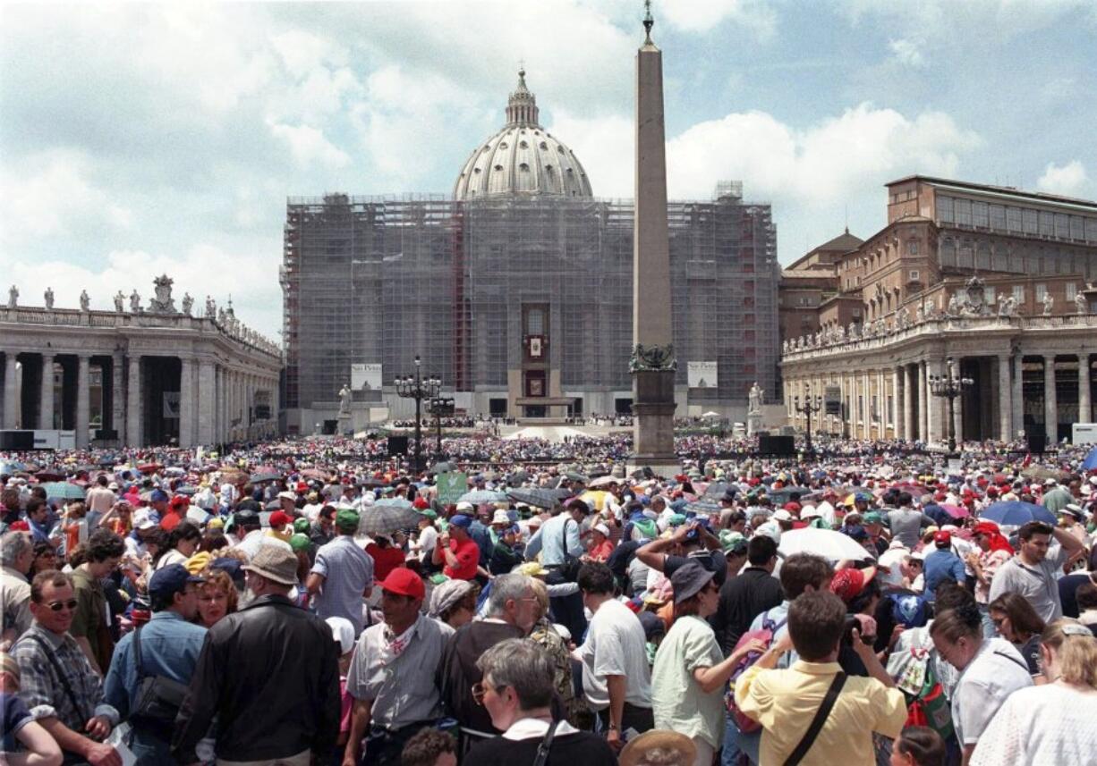 Pilgrims crowd St. Peter&rsquo;s Square at the Vatican, Saturday, May 30, 1998, on Pentecost Day. The Vatican crosses a key milestone Thursday, May 9, 2024, in the run-up to its 2025 Jubilee with the promulgation of the official decree establishing the Holy Year: a once-every-quarter-century event that is expected to bring some 32 million pilgrims to Rome and has already brought months of headaches to Romans.