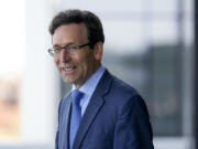 FILE - Washington Attorney General Bob Ferguson is seen, April 27, 2023, at the University of Washington&rsquo;s Hans Rosling Center for Population Health in Seattle. The Catholic church is refusing to cooperate with a Washington state investigation into whether it unlawfully used charitable trust funds to cover up sexual abuse by priests, Attorney General Ferguson said Thursday, May 9, 2024, and he asked a court to force the Seattle Archdiocese to turn over decades of records.