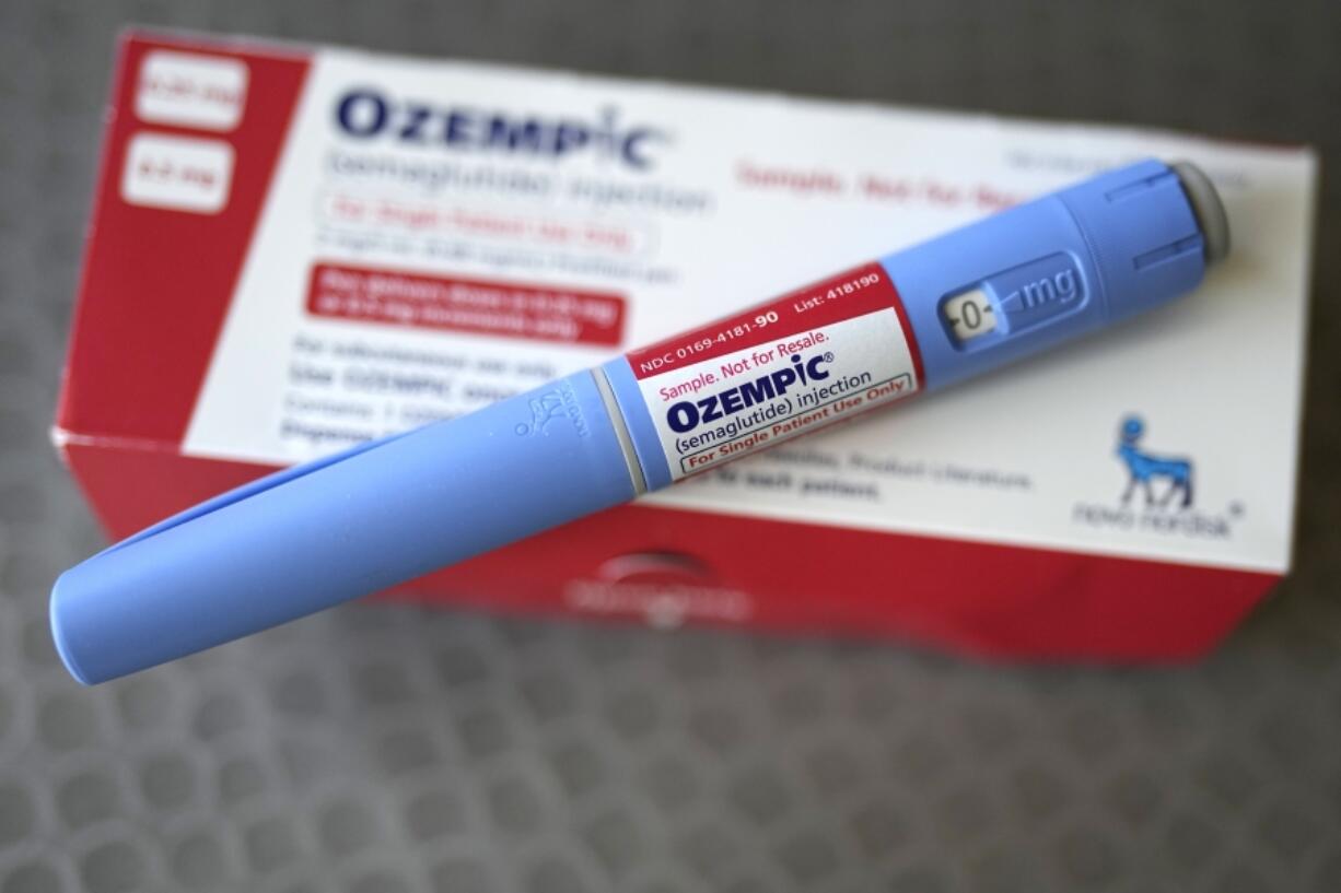 FILE - The injectable drug Ozempic is shown Saturday, July 1, 2023, in Houston. Even as millions of older adults clamor for drugs such as Ozempic and Wegovy, monthly use of the medications known as GLP-1 receptor agonists soared nearly 600% between 2020 and 2023 in people under 25 &ndash; and as young as 12. (AP Photo/David J.