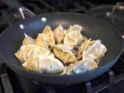 The Post-Gazette&Ccedil;&rsquo;s Gretchen McKay shows the process for making Japanese gyoza, fried dumplings at her home.