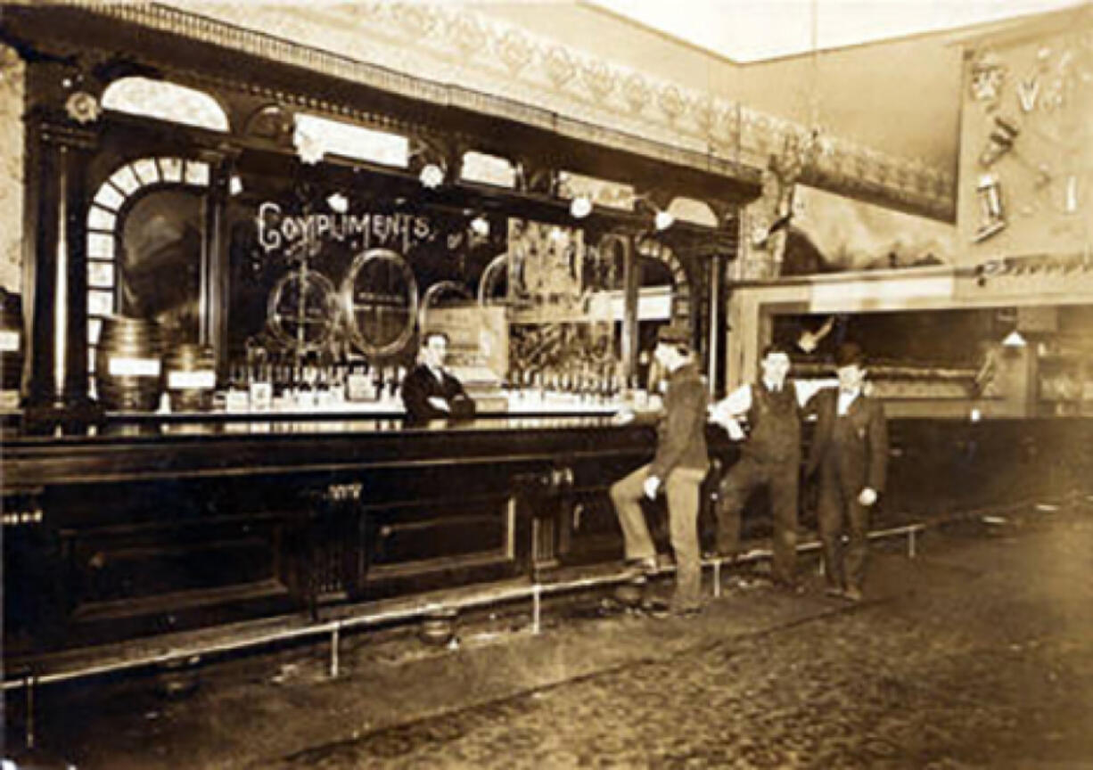 William Shoenig stands behind the bar at the Lehthle Saloon at 502 Main St. in Vancouver in this undated photo. Before Prohibition, local groups fiercely debated the propriety of saloons, and how to regulate and tax them.