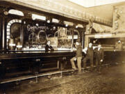 William Shoenig stands behind the bar at the Lehthle Saloon at 502 Main St. in Vancouver in this undated photo. Before Prohibition, local groups fiercely debated the propriety of saloons, and how to regulate and tax them.