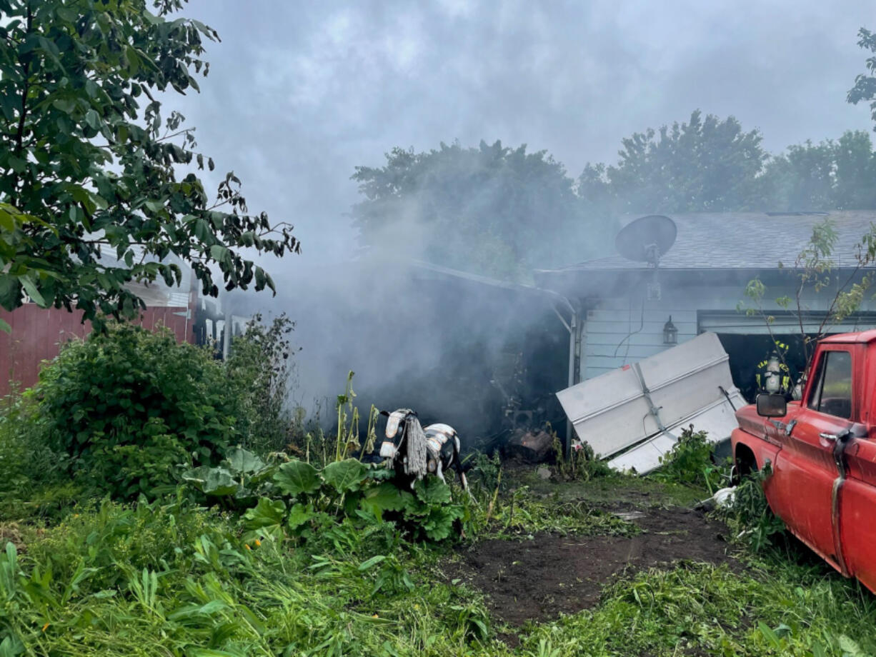 Vancouver Fire Department
Vancouver firefighters rescued one person and six dogs from a burning house Sunday afternoon in the 4600 block of N.E. 47th Street.