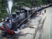 Passengers board before the No. 15 Shay locomotive before departs for a Yosemite Mountain Sugar Pine Railroad &ldquo;moonlight special&rdquo; excursion through the Sierra National Forest on June 6, 2019.