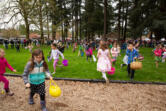 Kids scramble for eggs during the annual Easter egg hunt at Crown Park in Camas in 2019.