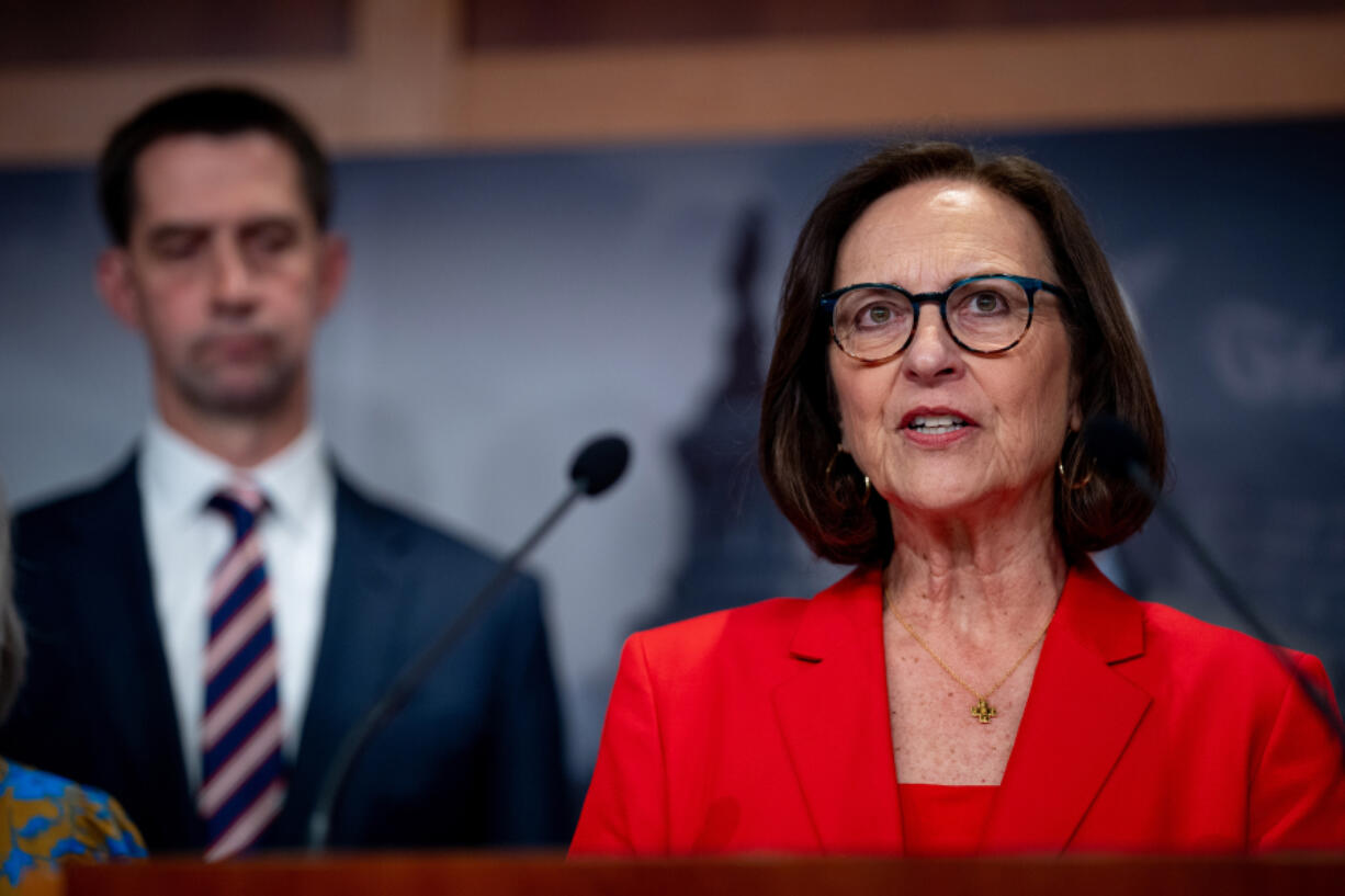 Sen. Deb Fisher (R-NE) (R), accompanied by Sen. Tom Cotton (R-AR) (L) speaks during a news conference on Capitol Hill on May 1, 2024, in Washington, D.C.