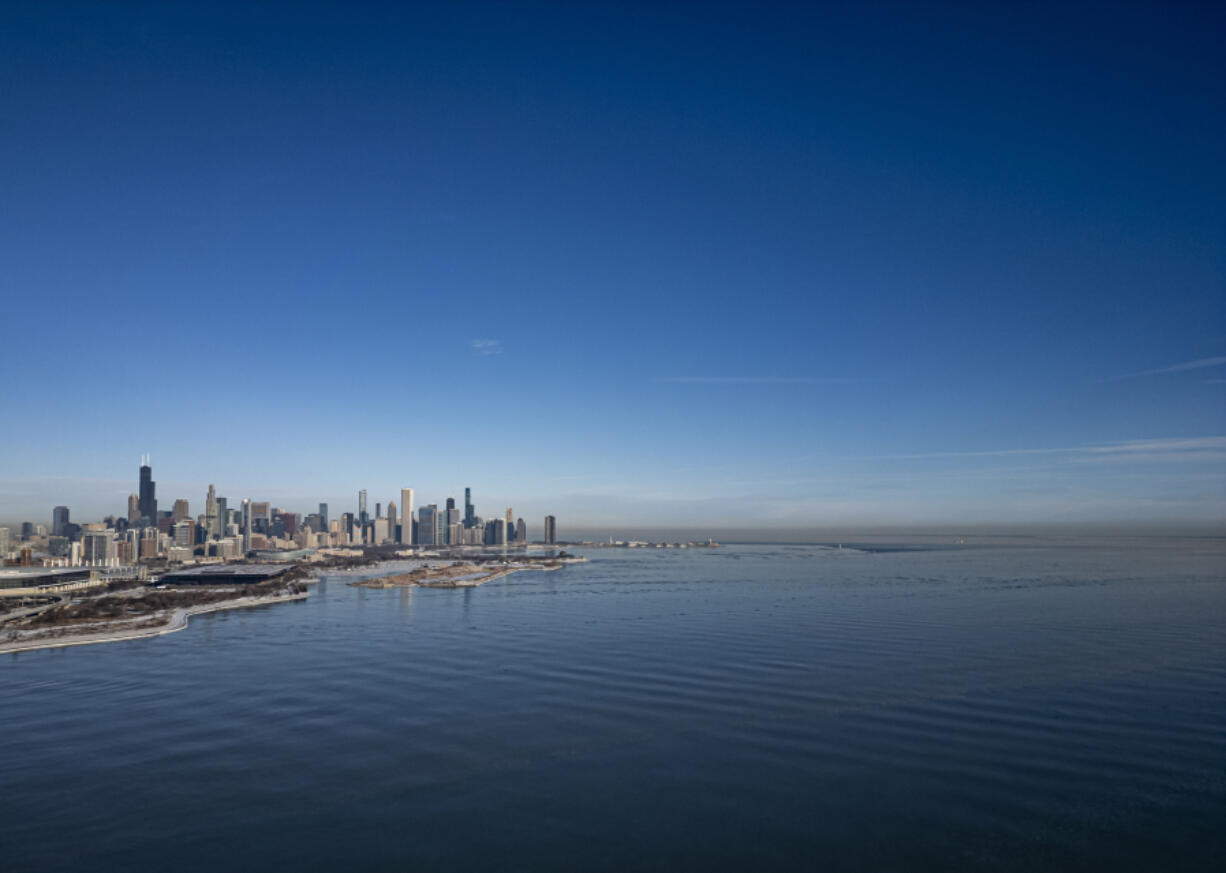 Two toxic forever chemicals, PFAs and PFOs that mainly come through rain and contaimnated air, are on the rise in Lake Michigan. The Chicago skyline on Lake Michigan after a week with temperatures around zero on Jan. 21, 2024.