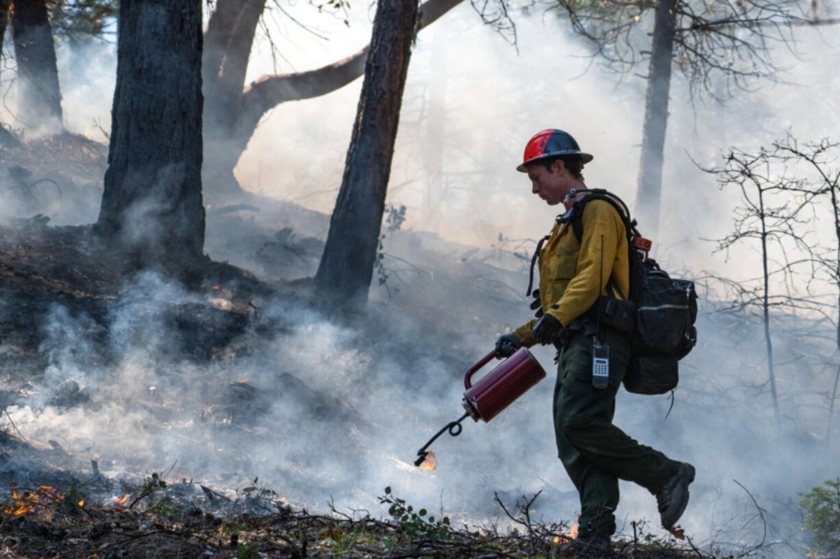 Firefighters undertake a prescribed burn at the Upper Applegate Watershed near Medford on Thursday, April 27, 2023. Such burns can help reduce the risk of large wildfires.