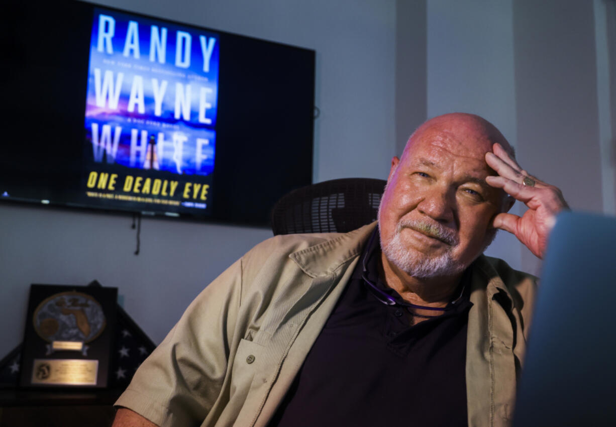 Author Randy Wayne White works in this office at his home on May 13 in Terra Ceia, Fla., where he and his wife are living while still waiting for their Sanibel home&rsquo;s repairs to be finished.