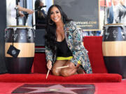 Sheila E. poses with her Hollywood Walk of Fame Star during a ceremony July 12, 2023 in Los Angeles.