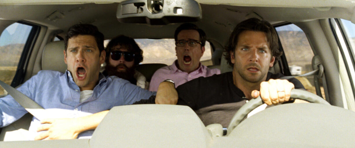 From left, Justin Bartha as Doug, Zach Galfianakis as Alan, Ed Helms as Stu and Bradley Cooper as Phil in &ldquo;The Hangover Part III.&rdquo; (Warner Bros.