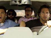 From left, Justin Bartha as Doug, Zach Galfianakis as Alan, Ed Helms as Stu and Bradley Cooper as Phil in &ldquo;The Hangover Part III.&rdquo; (Warner Bros.