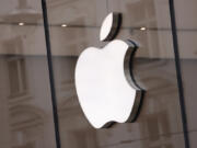 The Apple logo hangs on an Apple Store on March 25, 2024, in Berlin.