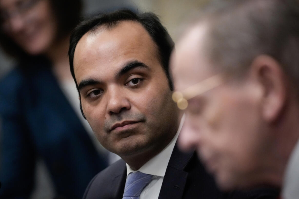 Director of the Consumer Financial Protection Bureau Rohit Chopra listens during a meeting of the Financial Stability Oversight Council at the U.S. Department of Treasury on Dec. 14, 2023, in Washington, D.C.