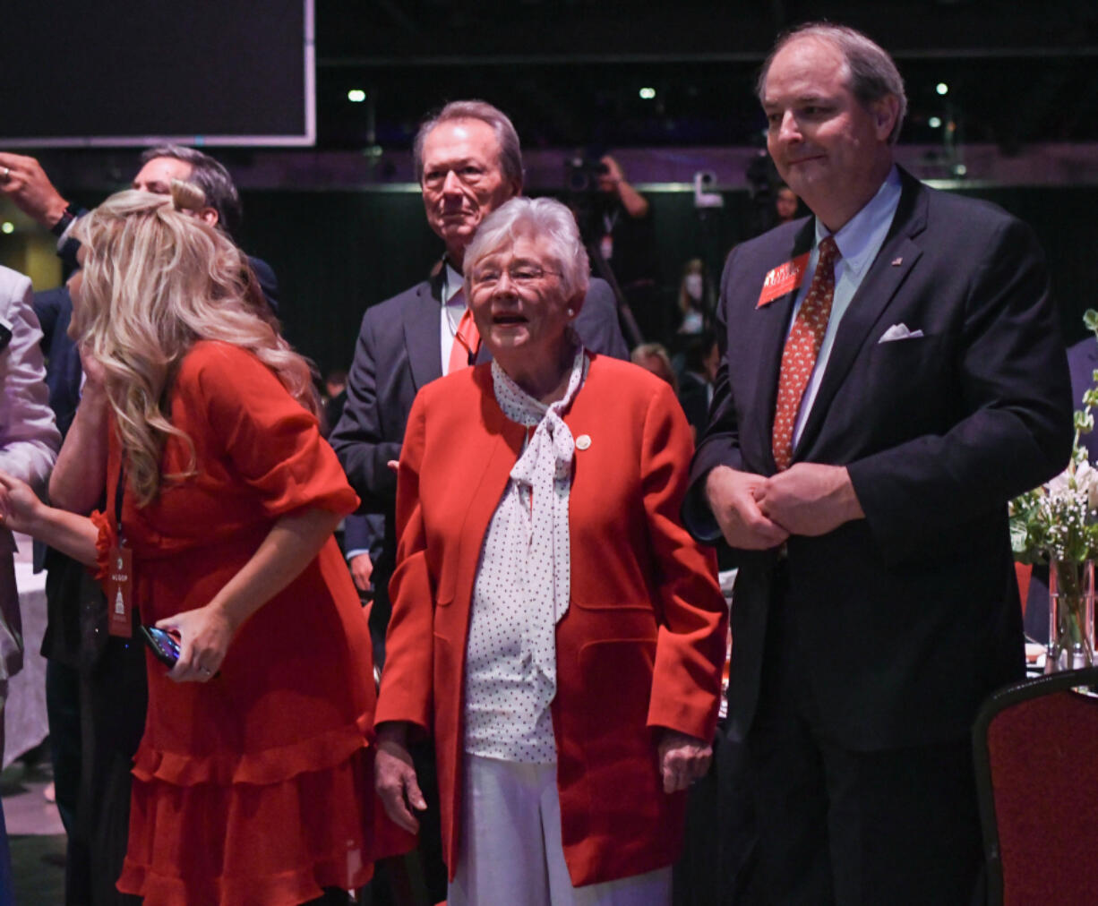 Alabama Gov. Kay Ivey listens to former President Donald Trump speak during the Alabama Republican Party&Ccedil;&fnof;&Ugrave;s Summer meeting at the Renaissance Montgomery Hotel on Aug. 4, 2023, in Montgomery, Alabama.