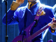 Prince performs &ldquo;Purple Rain&rdquo; during the 46th Annual Grammy Awards on Feb. 8, 2004, at the Staples Center in Los Angeles.