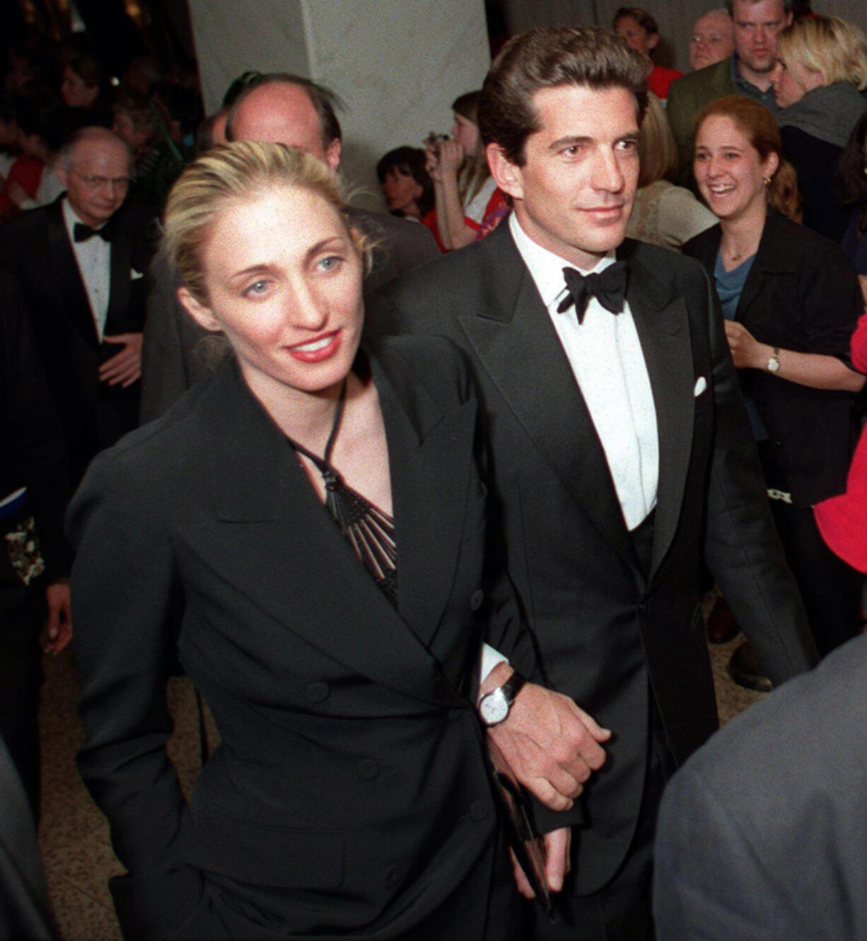 John F. Kennedy Jr. and his wife, Carolyn Bessette-Kennedy, leave the White House Correspondents&rsquo; Association&rsquo;s annual dinner May 1, 1999, in Washington, D.C.