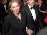 John F. Kennedy Jr. and his wife, Carolyn Bessette-Kennedy, leave the White House Correspondents&rsquo; Association&rsquo;s annual dinner May 1, 1999, in Washington, D.C.