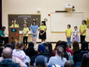 From left to right: Staff member Kristin Sharber watches on as third grader Mathilda Kanyid gives a speech. Second grader Alexia Vazquez Gutierrez, fourth grader Heartlee Butler, fourth grader Alejandra Mendez Rodriquez, first grader Scout Sorvald, kindergartner Scarlett Garrot and fifth grader Dylan Richmond also all prepared speeches for Leadership Day at Hazel Dell Elementary School on Wednesday morning.