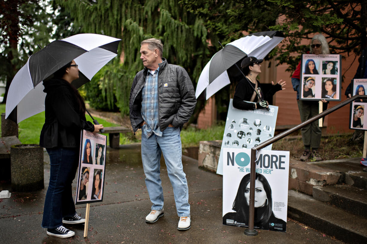 Sela Blas of the National Women&rsquo;s Coalition Against Violence &amp; Exploitation, from left, joins supporters of Star Murrah, including Joe Thuney, Danielle Mikinka and Christina Dodds on Monday while standing outside the Clark County Courthouse. The group was rallying against the possibility that the man accused of killing Star Murrah, her estranged husband, is found not-guilty by reason of insanity. His hearing is scheduled for Thursday.