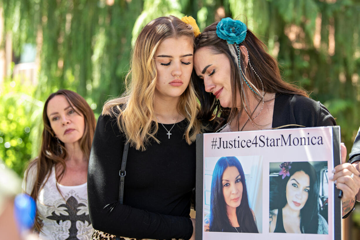 Rene Hanson, from left, joins Angel Ristau and her mom, Jenn Ristau, on the steps of the Clark County Courthouse after Michael Murrah, the estranged husband of their friend, Star Murrah, was found not guilty by reason of insanity Thursday in her 2021 killing. All three women were close friends of Star Murrah&rsquo;s, and the 45-year-old was Angel Ristau&rsquo;s godmother. &ldquo;She was like a second mom,&rdquo; she said.