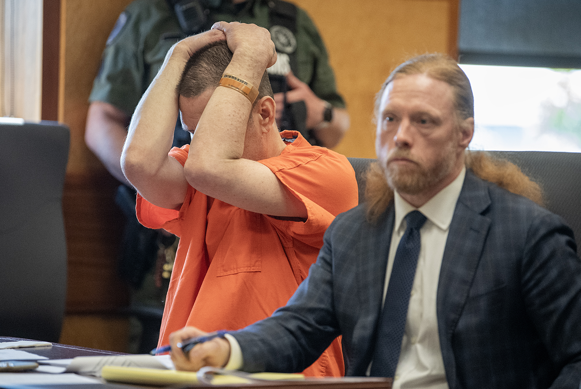 Defendant Michael Murrah, left, is overcome by emotion while joined by his lawyer, defense attorney Shon Bogar, at the Clark County Courthouse on Thursday morning, June 6, 2024.