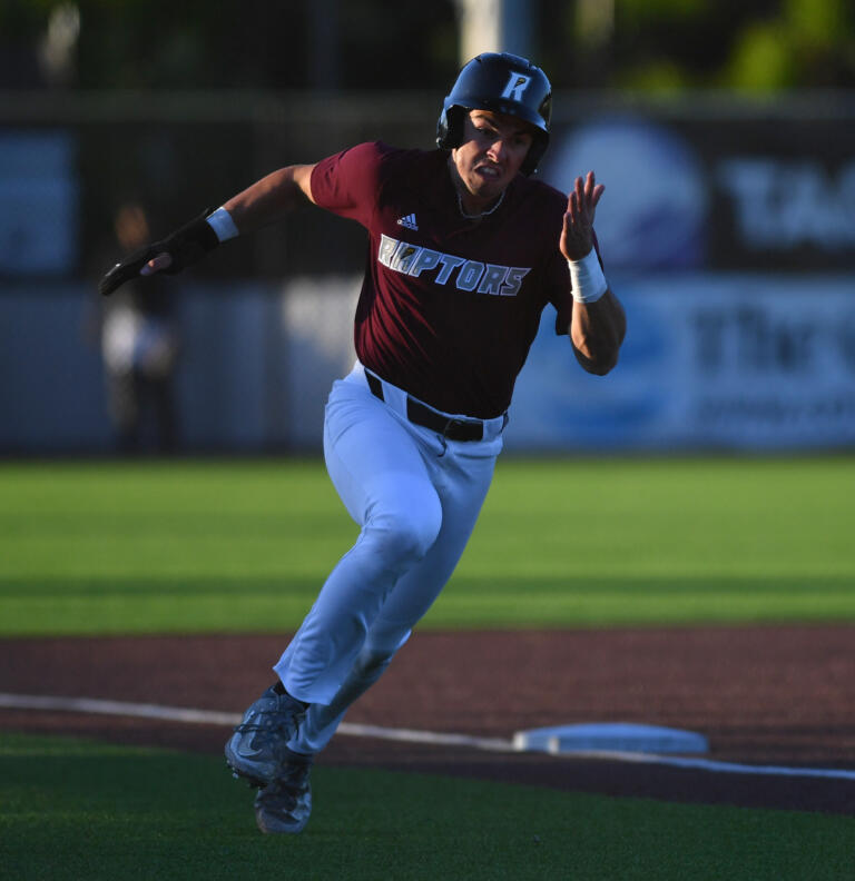 Ridgefield's Kyle Memarian heads to home plate Tuesday June 11, 2024, during the Raptors’ 10-0 win against Yakima Valley Pippins at the Ridgefield Outdoor Recreation Complex.