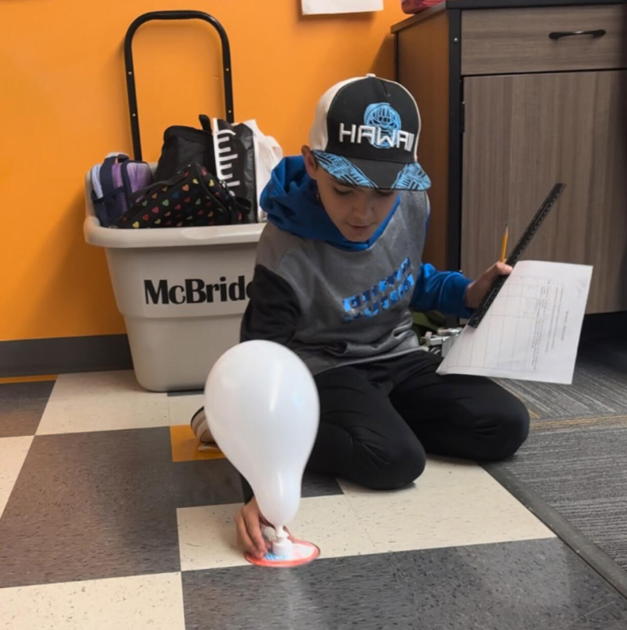 Students at Columbia River Gorge Elementary applied science and engineering concepts as they built balloon-powered hovercraft, and then tested and measured the results of some races.