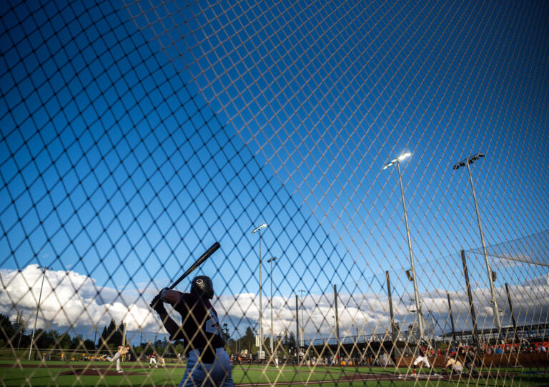 Ridgefield's Luke Iverson (23) waits on deck Thursday, July 27, 2024, during a game between the Raptors and the Bend Elks at the Ridgefield Outdoor Recreation Complex.