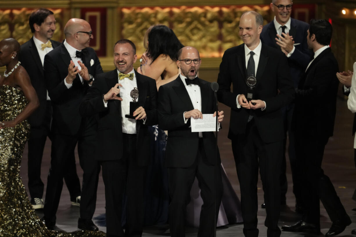 Matthew Rego, from left, Michael Rego, and Hank Unger accept the award for best musical for &ldquo;The Outsiders&rdquo; during the 77th Tony Awards on Sunday, June 16, 2024, in New York.