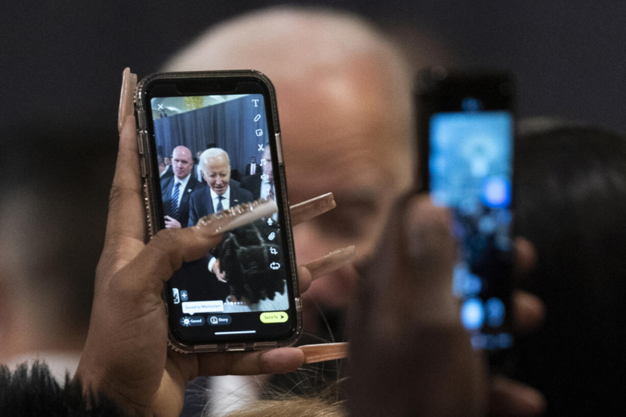 FILE - President Joe Biden is photographed by participants after delivering a speech commemorating Martin Luther King, Jr., Day, Monday, Jan. 16, 2023, in Washington.