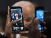 FILE - President Joe Biden is photographed by participants after delivering a speech commemorating Martin Luther King, Jr., Day, Monday, Jan. 16, 2023, in Washington.