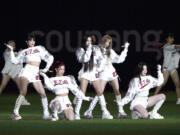 The K-pop group (G)I-dle performs prior to a baseball game at the Gocheok Sky Dome in Seoul, South Korea Thursday, March 21, 2024, in Seoul, South Korea.