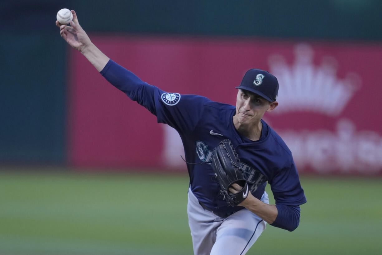 Seattle Mariners pitcher George Kirby works against the Oakland Athletics during the first inning of a baseball game in Oakland, Calif., Tuesday, June 4, 2024.