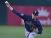 Seattle Mariners pitcher George Kirby works against the Oakland Athletics during the first inning of a baseball game in Oakland, Calif., Tuesday, June 4, 2024.