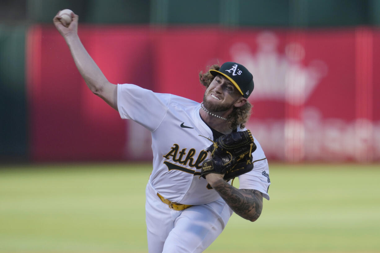 Oakland Athletics pitcher Joey Estes works against the Seattle Mariners during the first inning of a baseball game in Oakland, Calif., Wednesday, June 5, 2024.