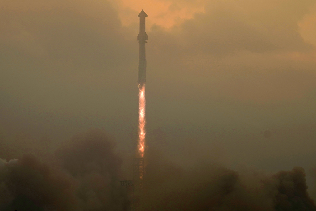 SpaceX's mega rocket Starship lifts off in a heavy haze for a test flight from Starbase in Boca Chica, Texas, Thursday, June 6, 2024.