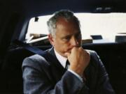 FILE - In this July 1990 photo, Oregon Gov. Neil Goldschmidt pauses during a road trip through the Columbia Gorge in Oregon. Goldschmidt, a former Oregon governor whose confession that he had sex with a 14-year-old girl in the 1970s blackened what had been a nearly sterling reputation, has died. He was 83.