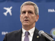 FILE - FAA Administrator Mike Whitaker speaks at a news conference at FAA headquarters in Washington, Thursday, May 30, 2024. Whitaker, the nation’s top aviation regulator, said Thursday, June 13, 2024, that the Federal Aviation Administration should have been more aware of manufacturing problems inside Boeing before a panel blew off a 737 Max during a flight in January.