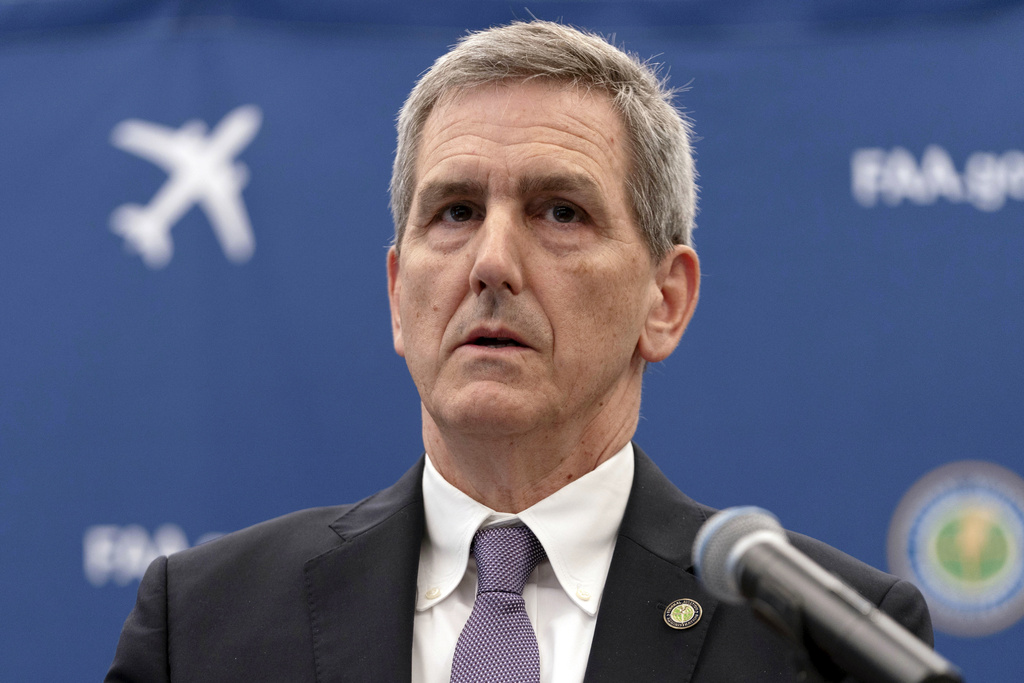 FILE - FAA Administrator Mike Whitaker speaks at a news conference at FAA headquarters in Washington, Thursday, May 30, 2024. Whitaker, the nation’s top aviation regulator, said Thursday, June 13, 2024, that the Federal Aviation Administration should have been more aware of manufacturing problems inside Boeing before a panel blew off a 737 Max during a flight in January.