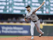 Chicago White Sox pitcher Garrett Crochet throws to a Seattle Mariners batter during the first inning of a baseball game Thursday, June 13, 2024, in Seattle.