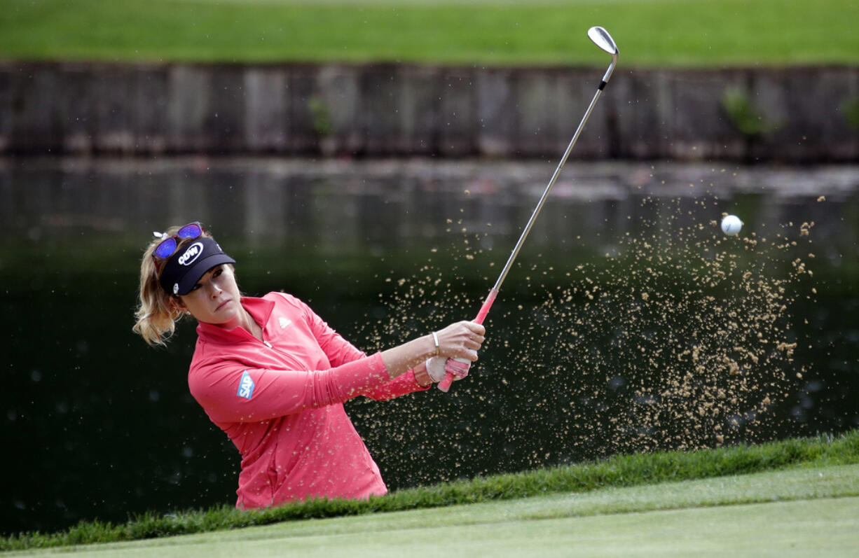 Paula Creamer hits out of a bunker during the first round at the Women's PGA Championship golf tournament at Sahalee Country Club on June 9, 2016, in Sammamish. The Seattle area will get a taste of major golf this week when the KPMG Women’s PGA Championship is played at Sahalee for the second time.