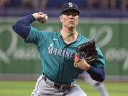 Seattle Mariners starter Bryan Woo pitches against the Tampa Bay Rays during the first inning of a baseball game Monday, June 24, 2024, in St. Petersburg, Fla.