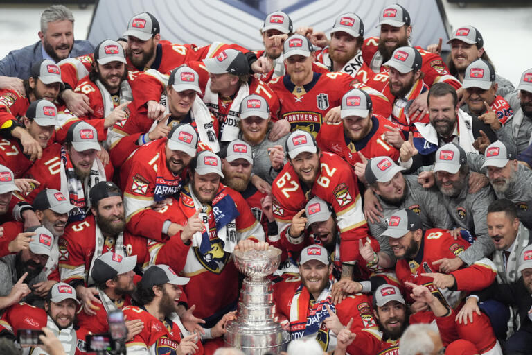 The Florida Panthers pose with the NHL hockey Stanley Cup trophy after defeating the Edmonton Oilers in Game 7 of the Final, Monday, June 24, 2024, in Sunrise, Fla.