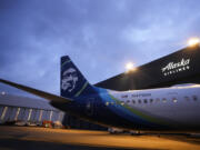 FILE - An Alaska Airlines Boeing 737 Max 9 with a door plug aircraft awaits inspection at the airline's hangar at Seattle-Tacoma International Airport Wednesday, Jan. 10, 2024, in SeaTac, Wash.  The National Transportation Safety Board is sanctioning Boeing for sharing information with the media, Thursday, June 27, about the 737 Max 9 door plug investigation that it wasn't supposed to.