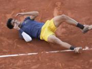 Spain&#039;s Carlos Alcarz celebrates winning the men&#039;s final of the French Open tennis tournament against Germany&#039;s Alexander Zverev at the Roland Garros stadium in Paris, France, Sunday, June 9, 2024.