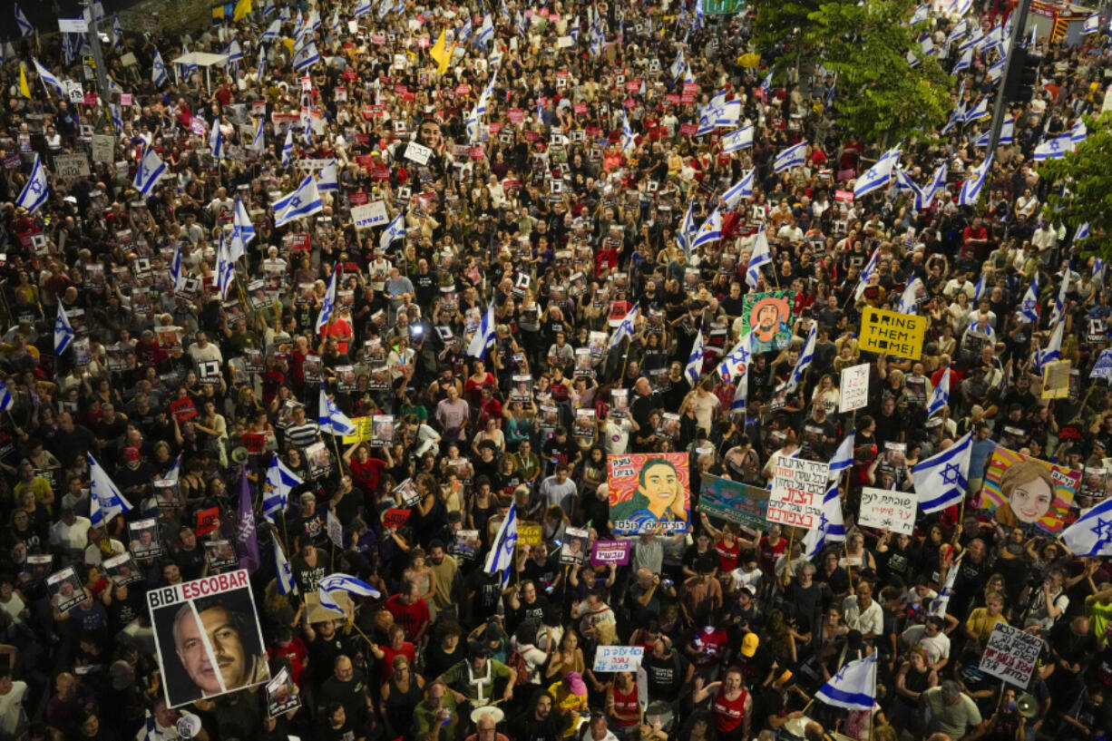 People protest against Israeli Prime Minister Benjamin Netanyahu&#039;s government and call for the release of hostages held in the Gaza Strip by the Hamas militant group, in Tel Aviv, Israel, Saturday, June 8, 2024. Israel said Saturday it rescued four hostages who were kidnapped in the Hamas-led attack on Oct. 7, the largest such recovery operation since the war began in Gaza.