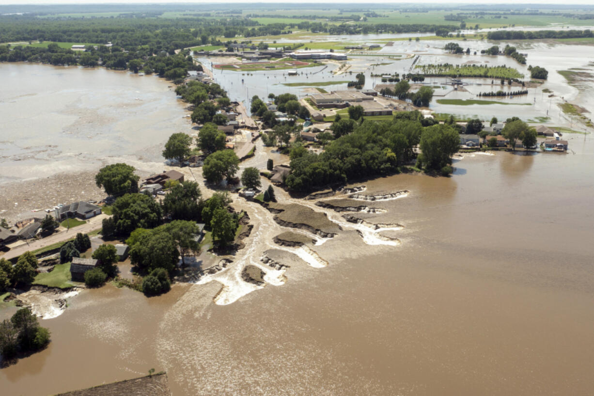 Floodwaters from the Big Sioux River erode land in North Sioux City, S.D., on Monday, June 24, 2024.